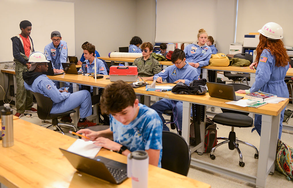 Students in the Columbia Aeronautics and Space Association work on projects